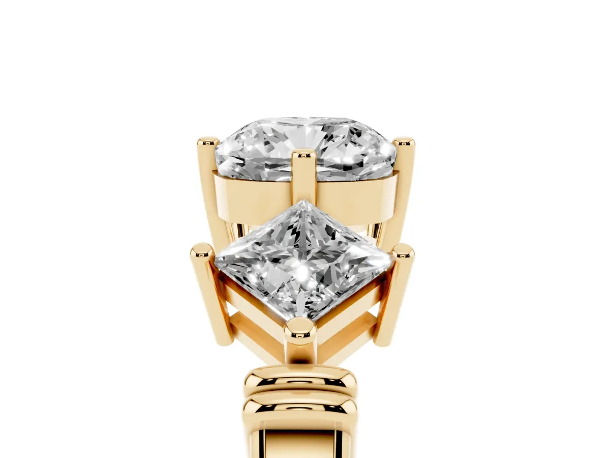 Three-Stone Cushion Cut and Princess Cut Diamond Ring with Channel Band and Four-Prong Setting Yellow gold