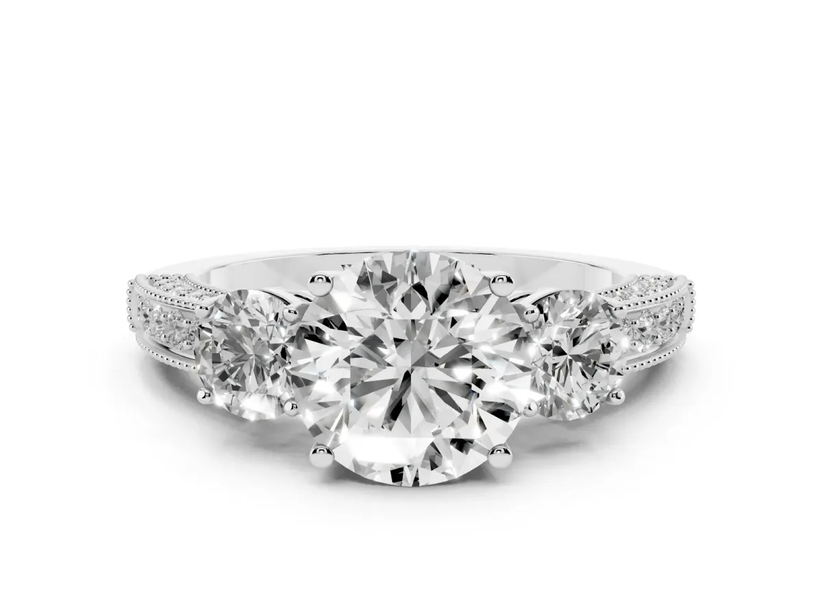 Round Cut Three-Stone Diamond Ring with Pavé Band and Four-Prong Setting Silver