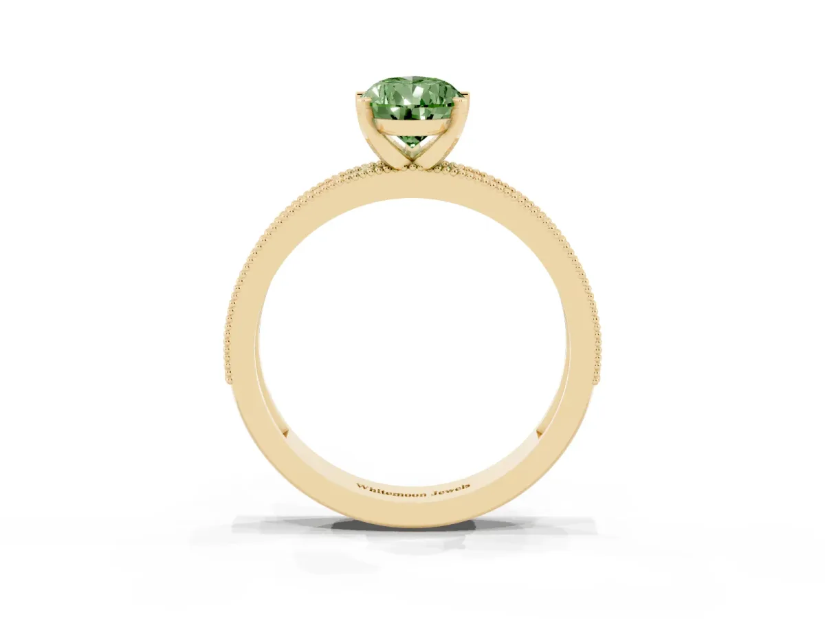 Fancy Green Pear Cut Diamond Milgrain Pavé Engagement Ring with Four-Prong Setting Yellow gold
