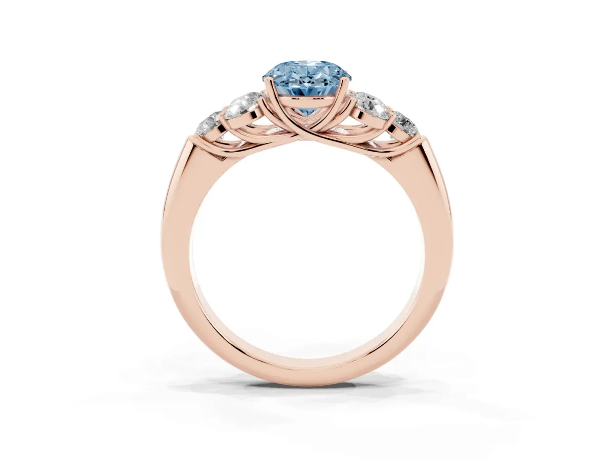 Fancy Blue Oval Cut Cut Diamond Cluster Ring with Round Accent Stones and Prong Setting on a Classic Band Rose gold