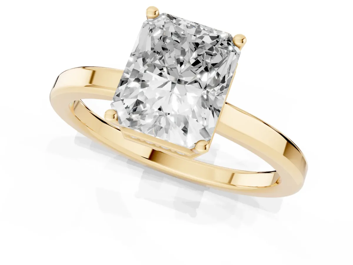 Radiant Cut Cut Solitaire Engagement Ring with Four-Prong Setting on a Classic Band Yellow gold