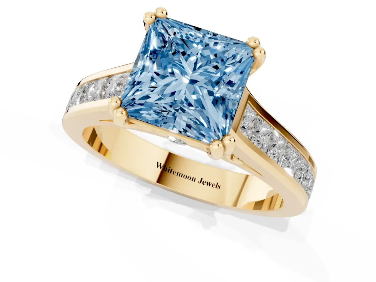 Fancy Blue Princess Cut Cut Channel Set Solitaire Engagement Ring with Prong Setting Yellow gold
