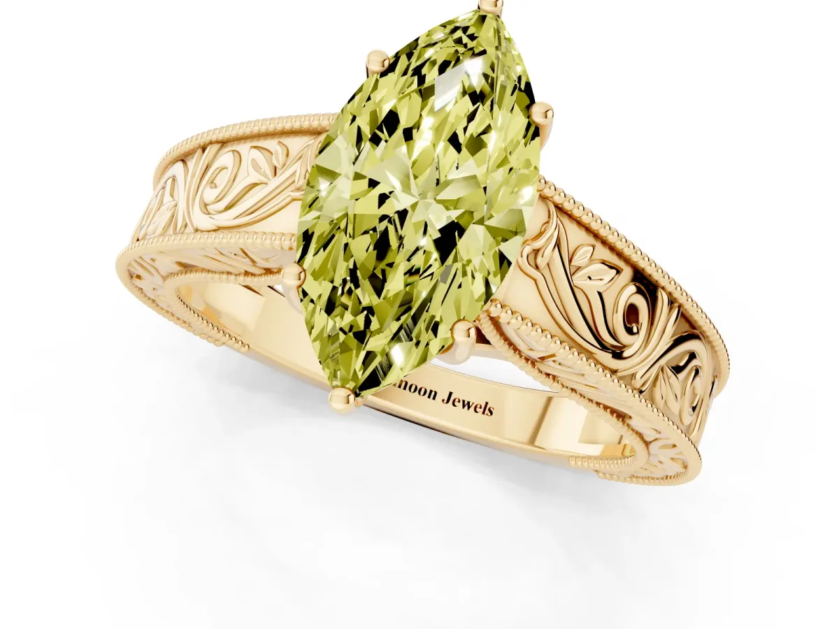 Fancy Yellow Marquise Cut Diamond Solitaire Ring with Engraved Band and Four-Prong Setting Yellow gold