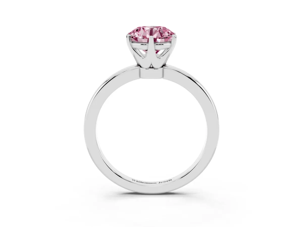 Fancy Pink Round Cut Solitaire Diamond Ring with Six-Prong Setting on a Classic Band Platinum