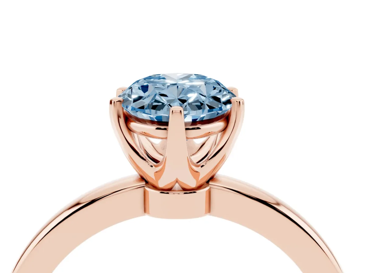 Fancy Blue Oval Cut Solitaire Diamond Ring with Six-Prong Setting on a Classic Band Rose gold