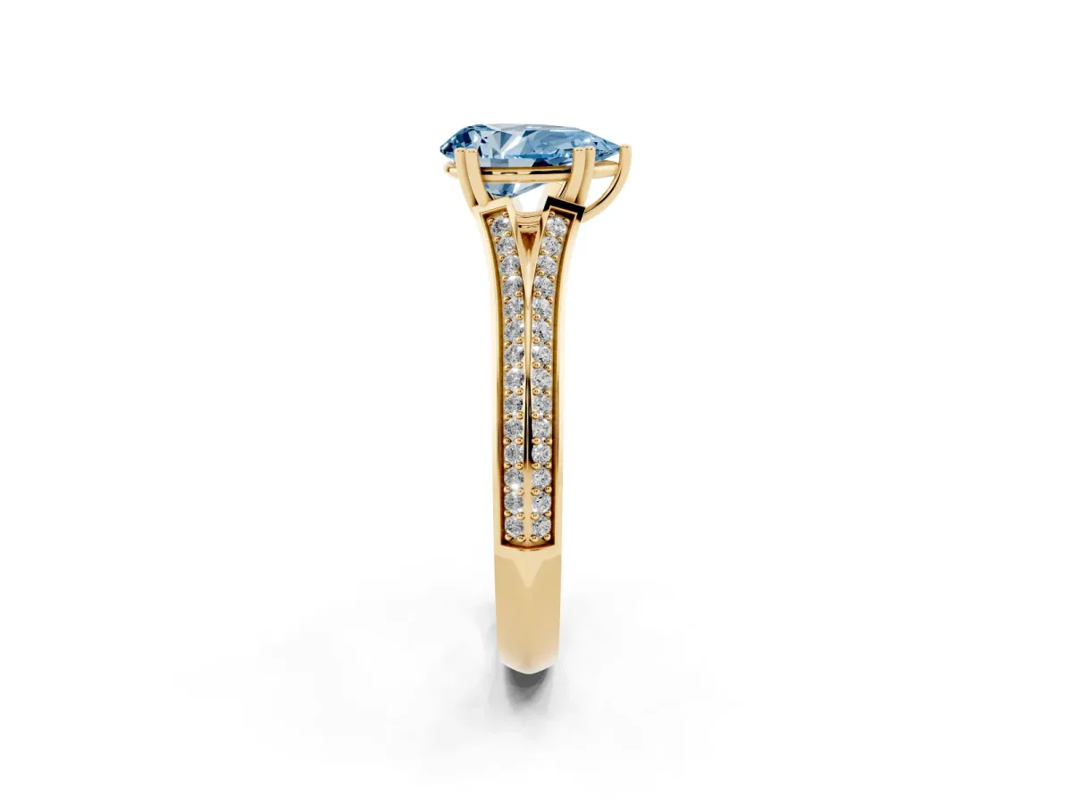 Fancy Blue Pear Cut Diamond Split Shank Engagement Ring with Pavé Band Yellow gold