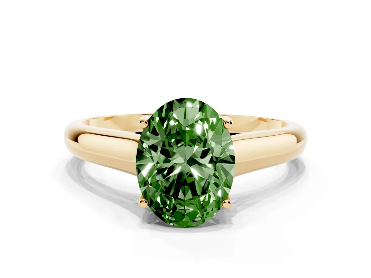 Fancy Green Oval Cut Solitaire Engagement Ring with Tapered Band and Four-Prong Setting Yellow gold