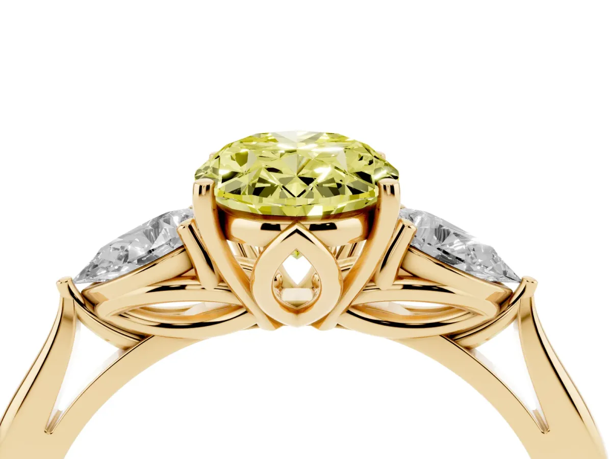 Fancy Yellow Three-Stone Oval Cut Diamond Ring with Pear Side Stones in Four-Prong Setting Yellow gold