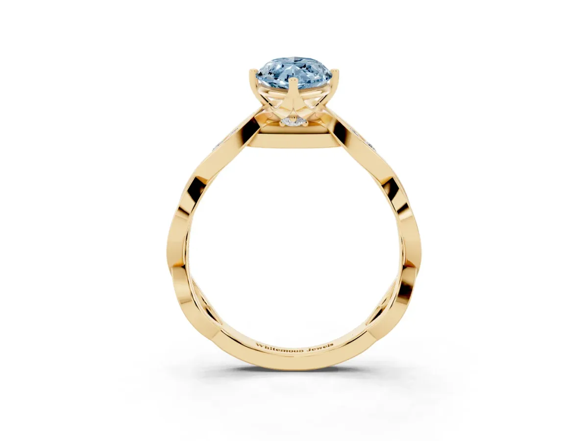 Fancy Blue Marquise Cut Solitaire Twist Band with Leaf Prong Setting Yellow gold