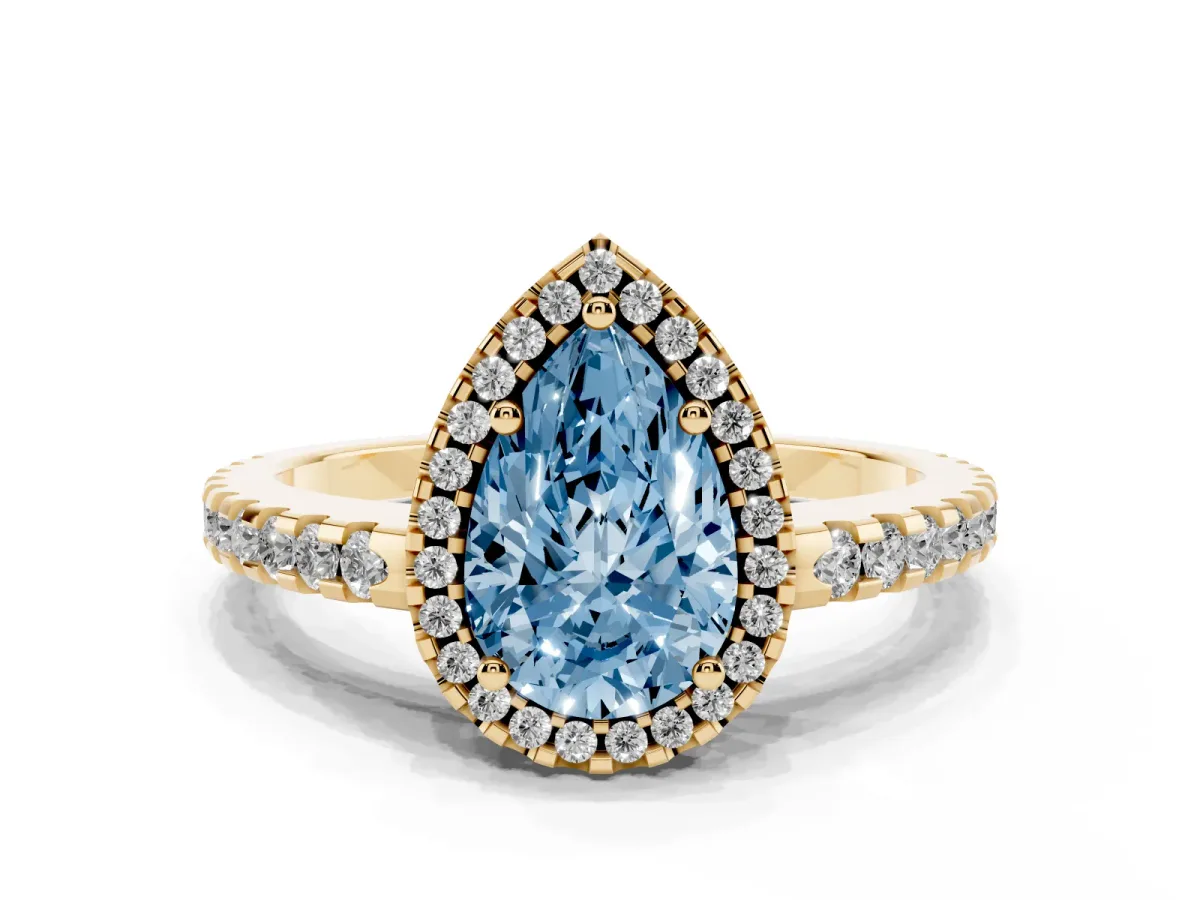 Fancy Blue Pear Cut Diamond Halo Engagement Ring with Pavé Band and Prong Setting Yellow gold
