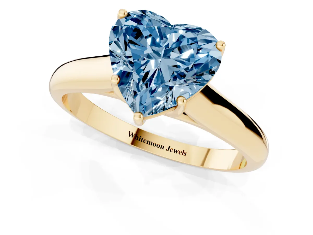 Fancy Blue Heart Cut Cut Diamond Solitaire Engagement Ring with Tapered Plain Band and Four-Prong Setting Yellow gold