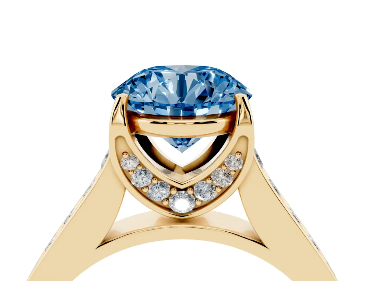 Fancy Blue Round Cut Brilliant Cut Diamond Engagement Ring with Pavé Band and Four-Prong Setting Yellow gold