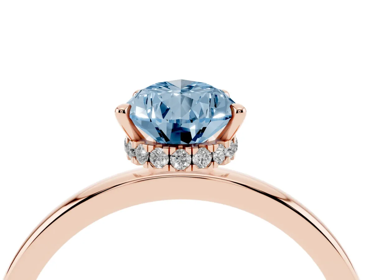 Fancy Blue Pear Cut Solitaire Engagement Ring with Cathedral Band and Four-Prong Setting Rose gold