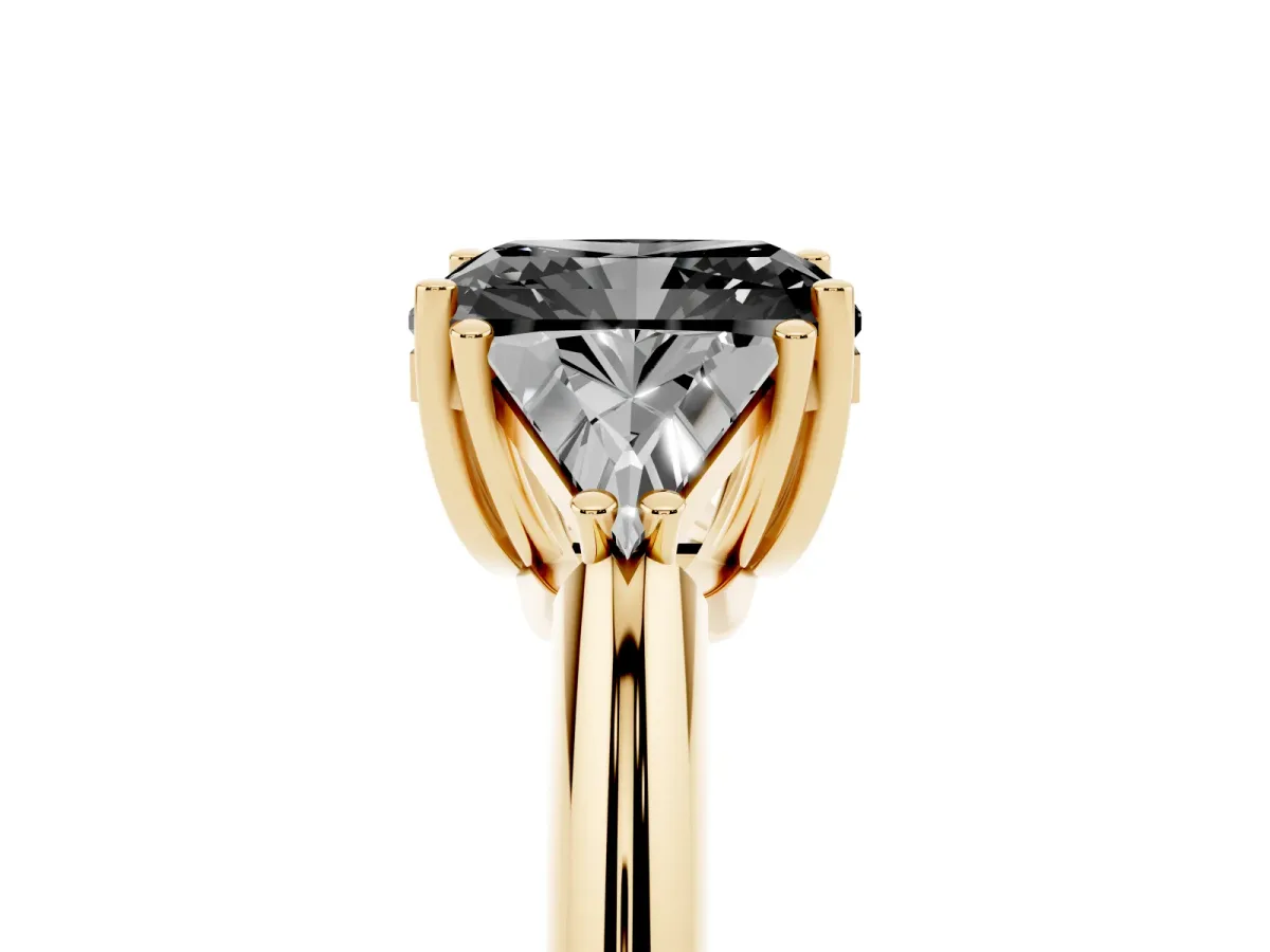 Fancy Black Three-Stone Radiant Cut Diamond Engagement Ring with Trillion Side Stones and Prong Setting Yellow gold