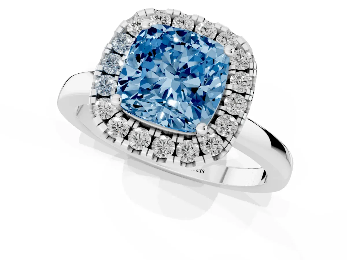 Fancy Blue Cushion Cut Halo Diamond Solitaire with Pavé Band and Four-Prong Setting Silver