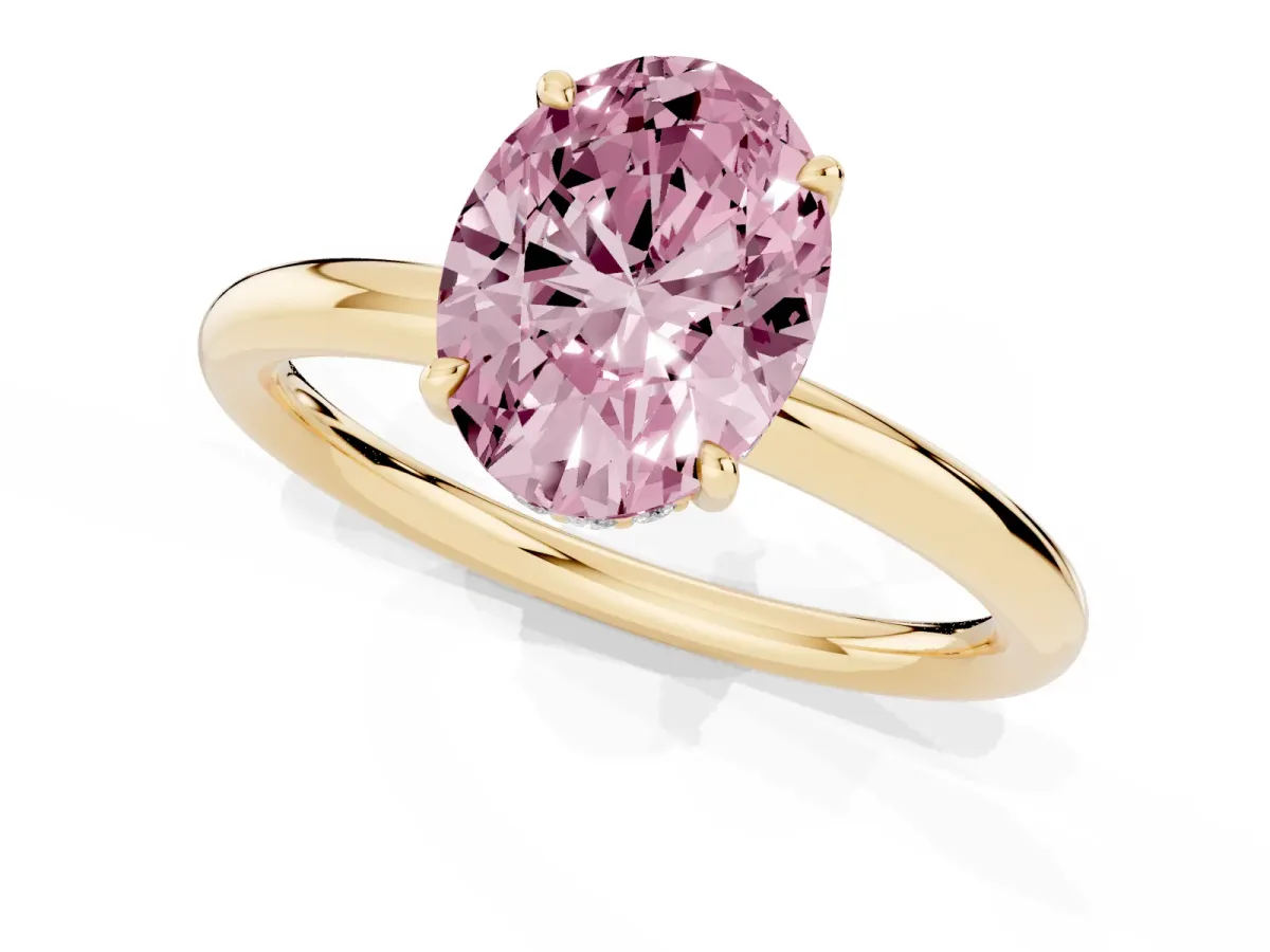 Fancy Pink Oval Cut Diamond Solitaire Ring with Thin Band and Four-Prong Setting Yellow gold