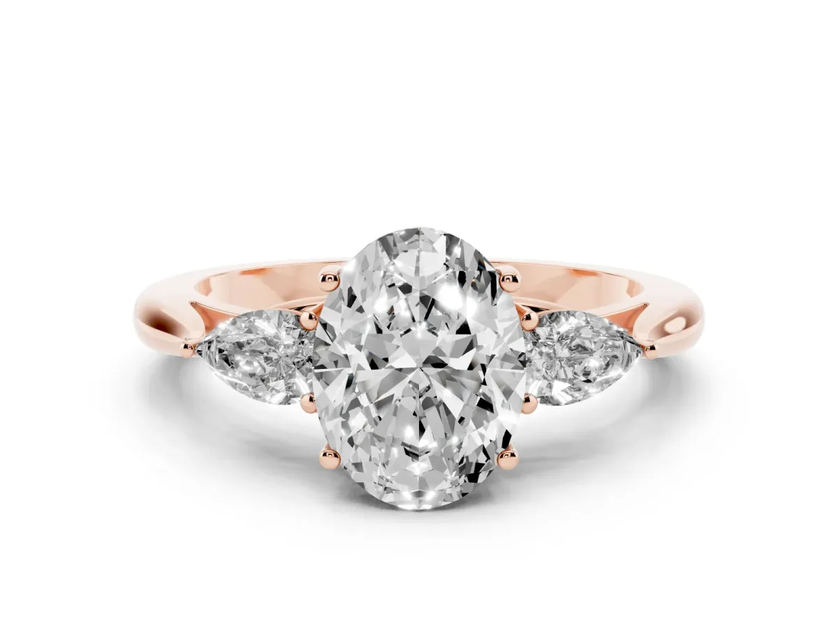 Three-Stone Oval Cut Brilliant Diamond Solitaire Ring with Tapered Band and Four-Prong Setting Rose gold
