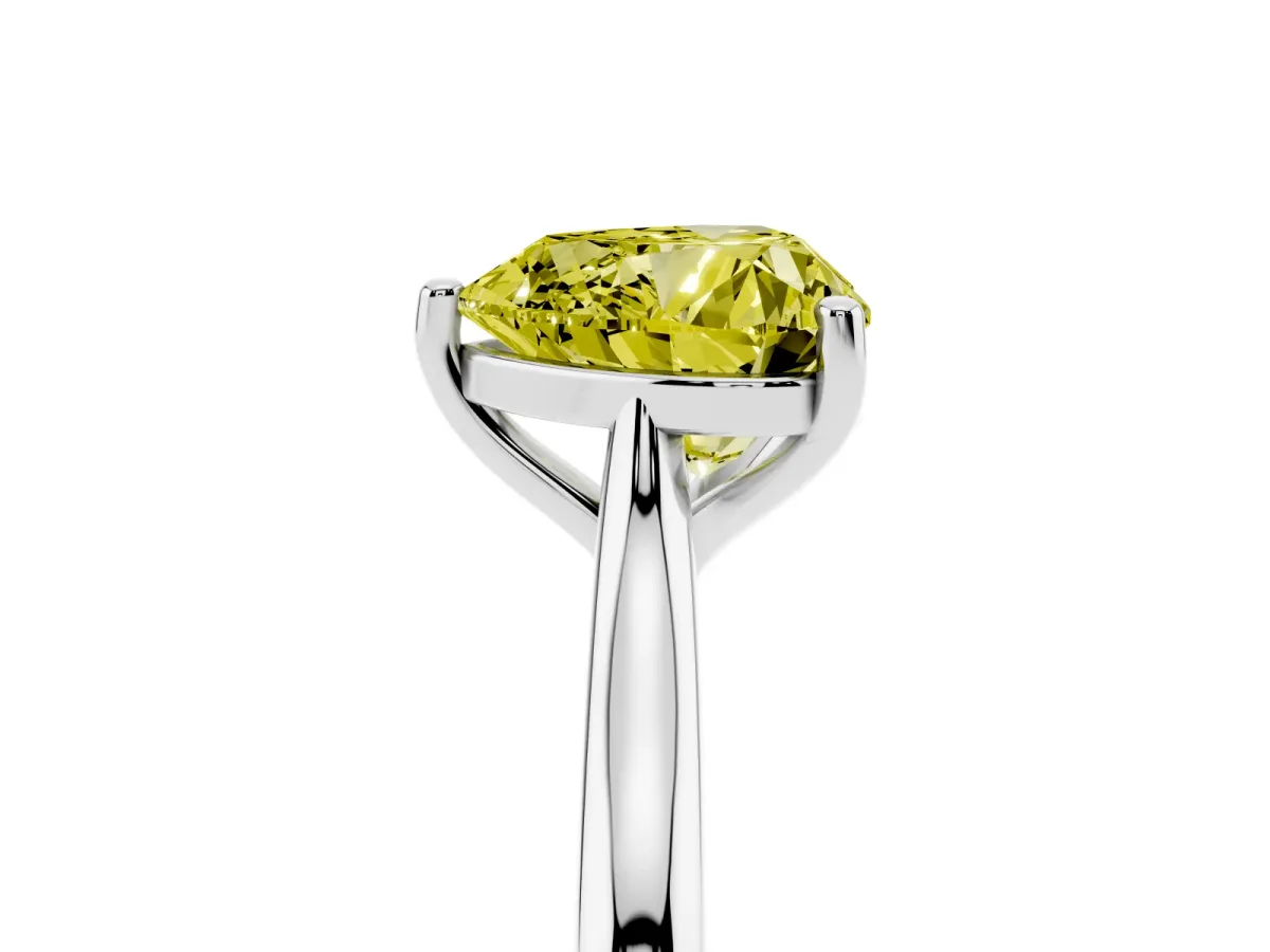Fancy Yellow Heart Cut Cut Solitaire Ring with Cathedral Band and Four-Prong Setting Silver