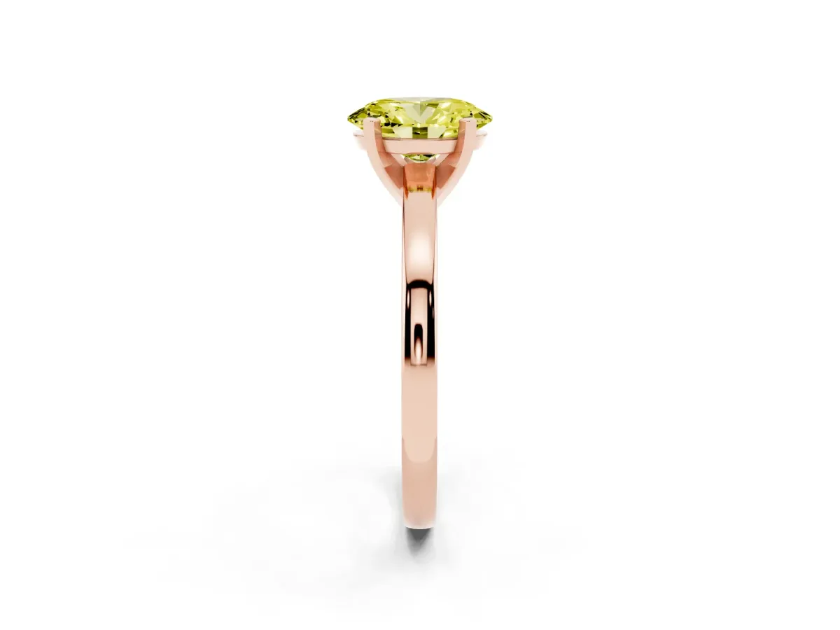 Fancy Yellow Oval Cut Solitaire Diamond Engagement Ring with Four-Prong Setting on a Classic Band Rose gold
