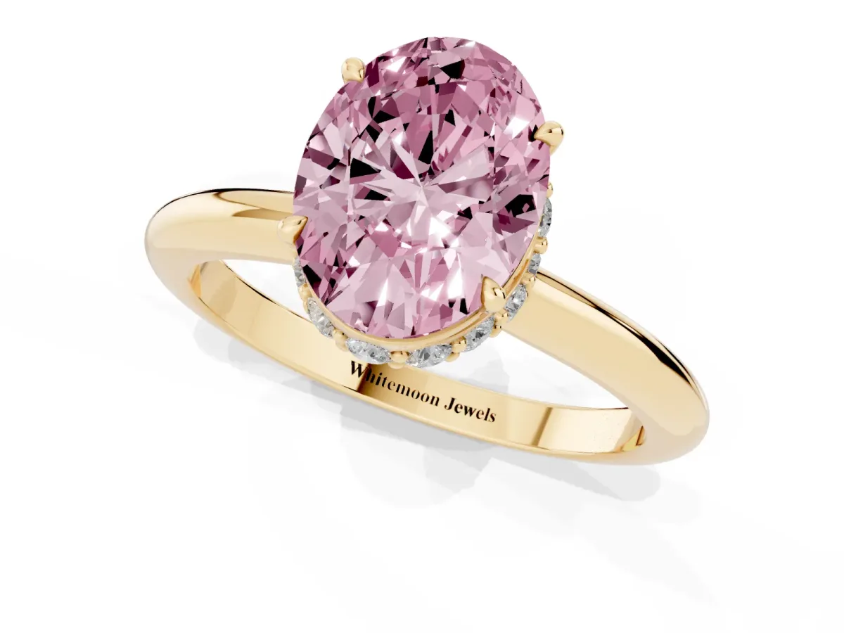 Fancy Pink Oval Cut Brilliant Solitaire Engagement Ring with Six-Prong Setting and Classic Band Yellow gold