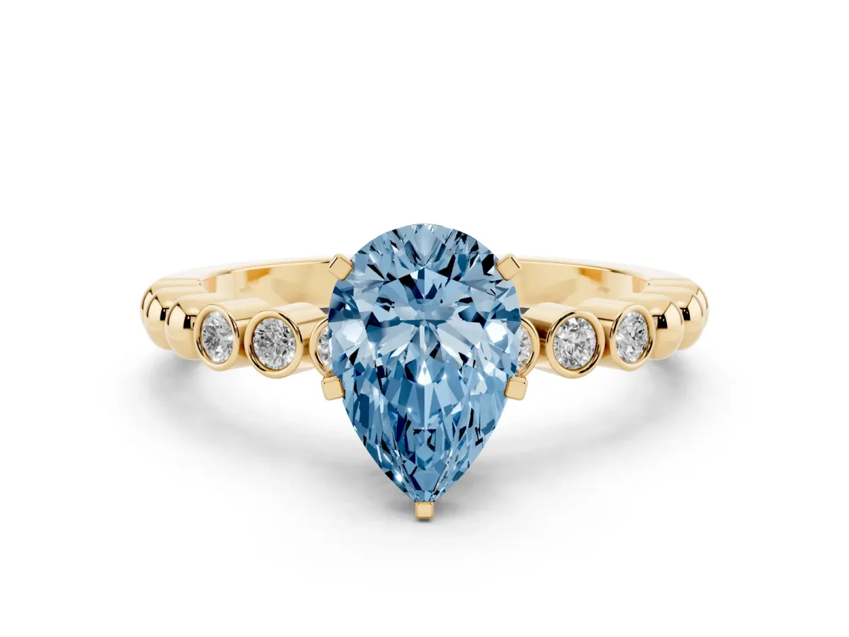 Fancy Blue Pear Cut Solitaire Bezel Accent Diamond Engagement Ring with Beaded Band and Four-Prong Setting Yellow gold