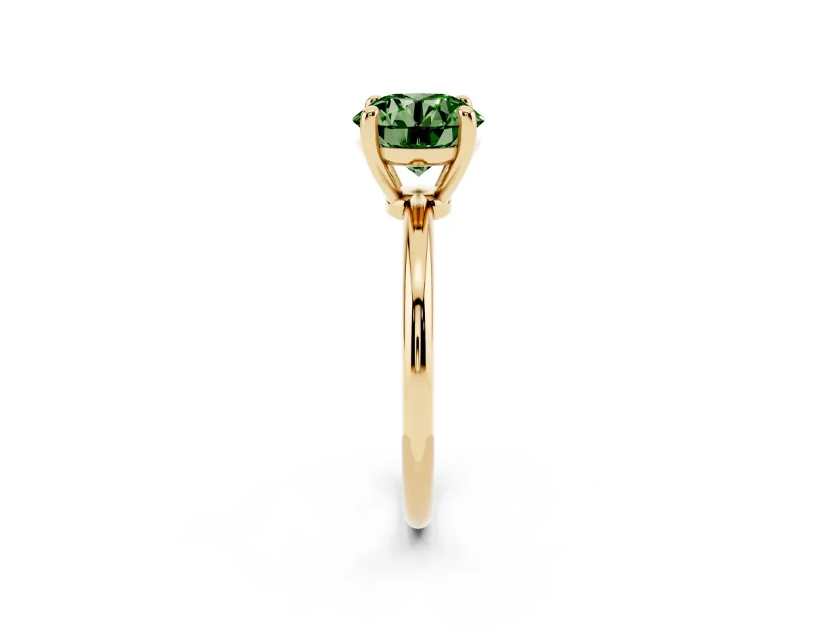 Fancy Green Round Cut Solitaire Diamond Ring with 4-Prong Setting on a Classic Band Yellow gold