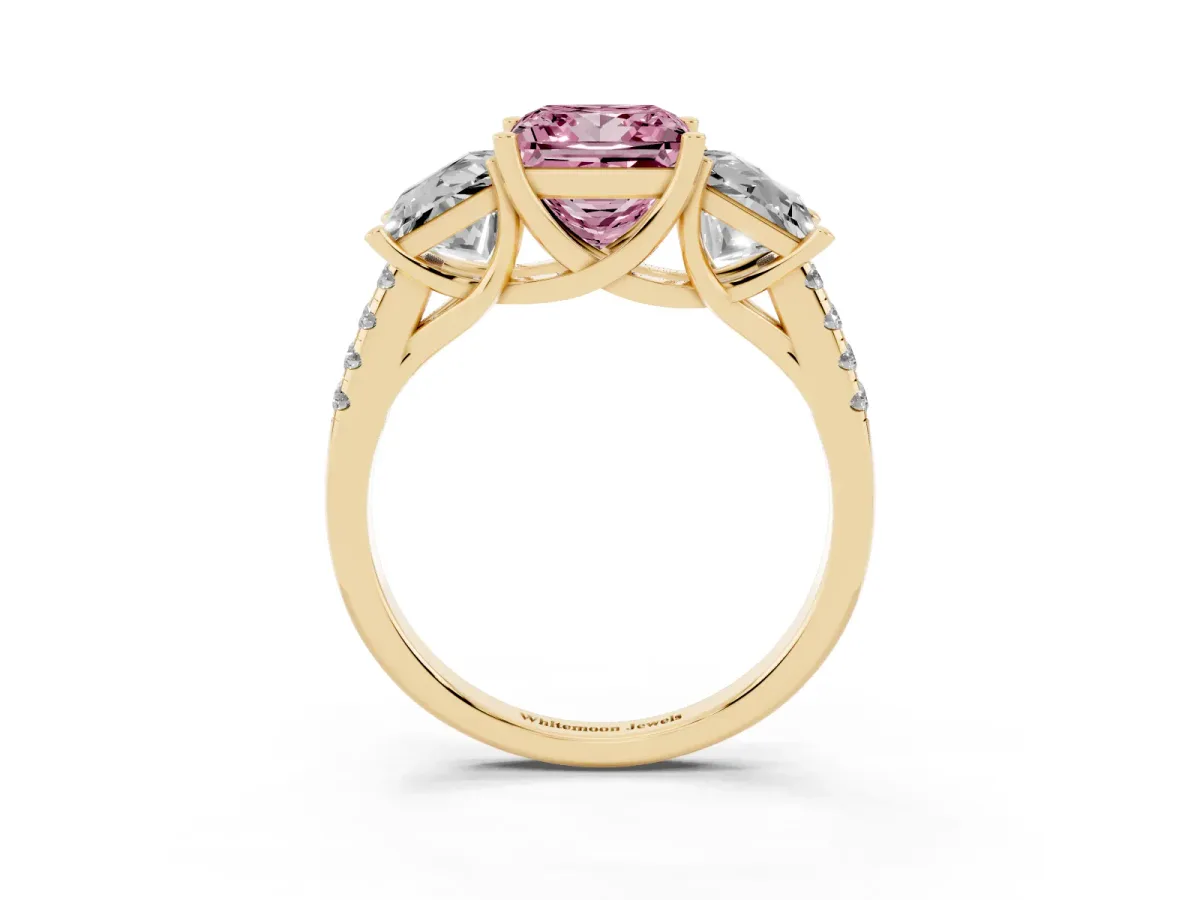 Fancy Pink Three-Stone Princess Cut Diamond Ring with Round Pavé Band and Prong Setting Yellow gold