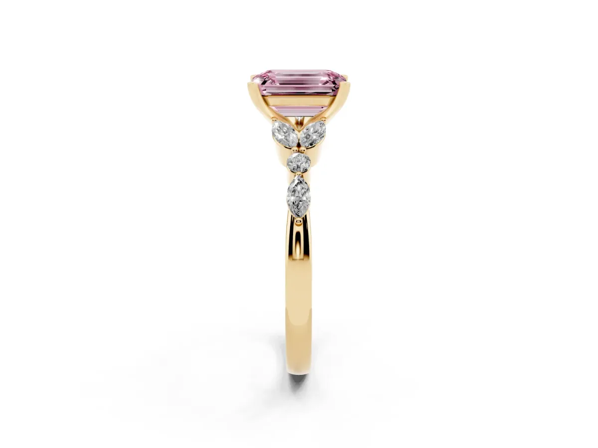 Fancy Pink Emerald Cut Diamond Solitaire Ring with Side Stones and Four-Prong Setting Yellow gold