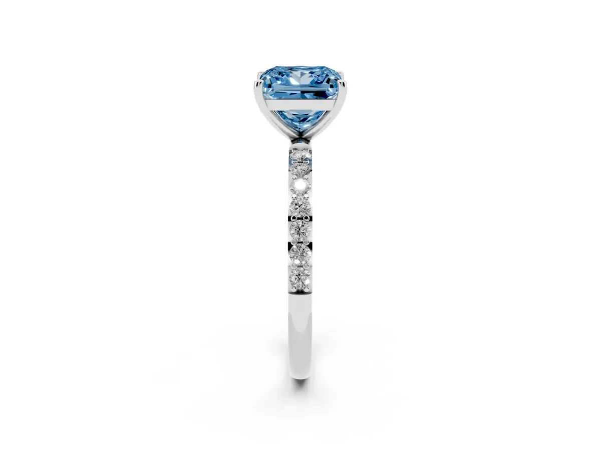 Fancy Blue Princess Cut Diamond Solitaire Ring with Round Pavé Shoulders and Prong Setting Silver