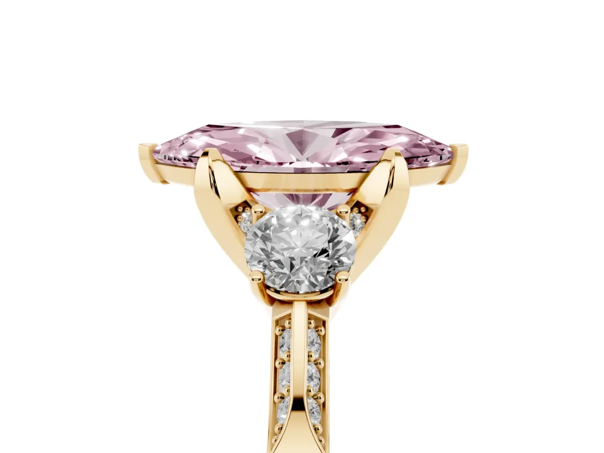 Fancy Pink Marquise Cut Brilliant Three-Stone Diamond Ring with Pavé Band and Four-Prong Setting Yellow gold