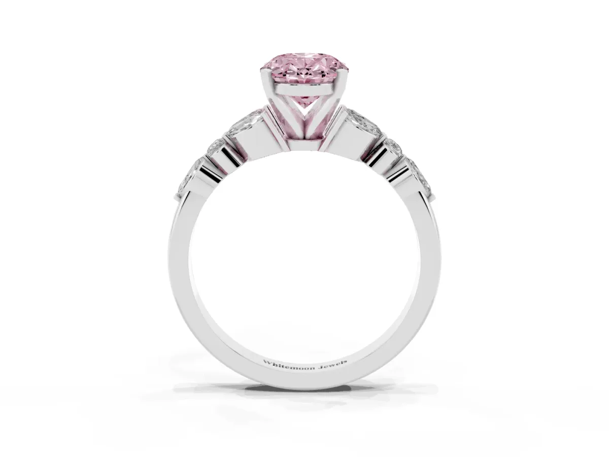 Fancy Pink Oval Cut Diamond Solitaire Ring with Side Stones and Four-Prong Setting Silver