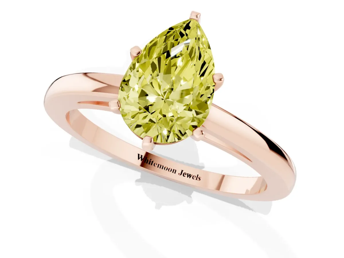 Fancy Yellow Pear Cut Solitaire Diamond Engagement Ring with Four-Prong Setting on a Classic Band Rose gold