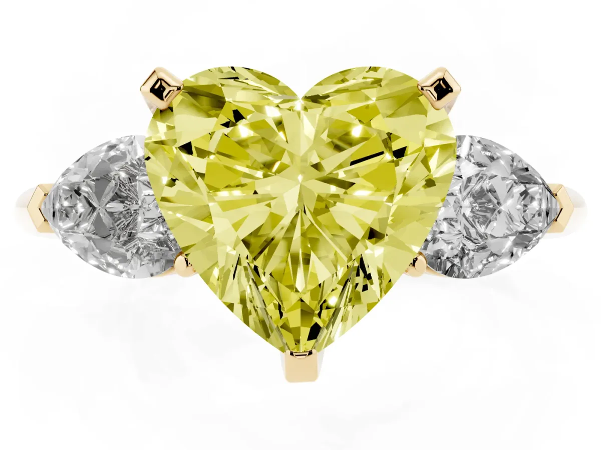 Fancy Yellow Three-Stone Heart Cut Diamond Ring with Pear Side Stones and Four-Prong Setting Yellow gold