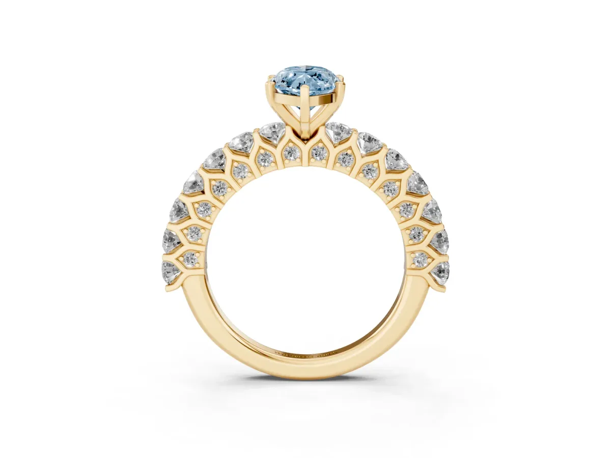 Fancy Blue Marquise Cut Diamond Solitaire Ring with Shared Prong Pavé Band and Four-Prong Setting Yellow gold
