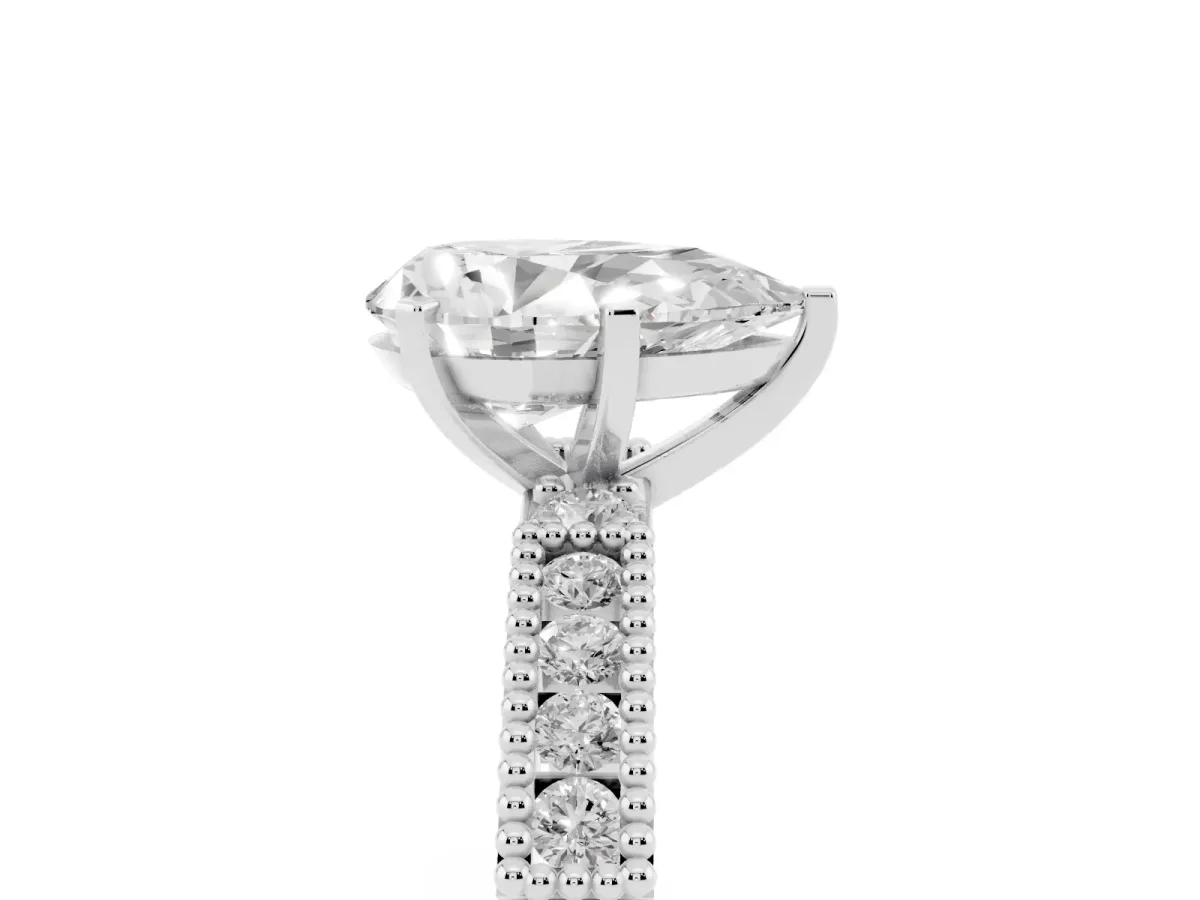 Pear Cut Solitaire with Pavé Band and Four-Prong Setting White gold