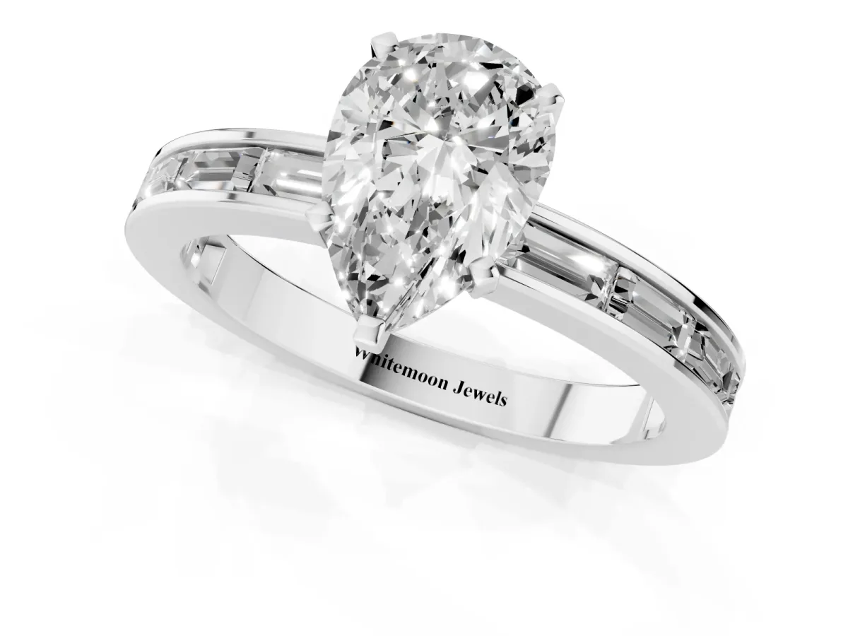 Pear Cut Solitaire Diamond Ring with Channel-Set Baguette Band and Four-Prong Setting White gold