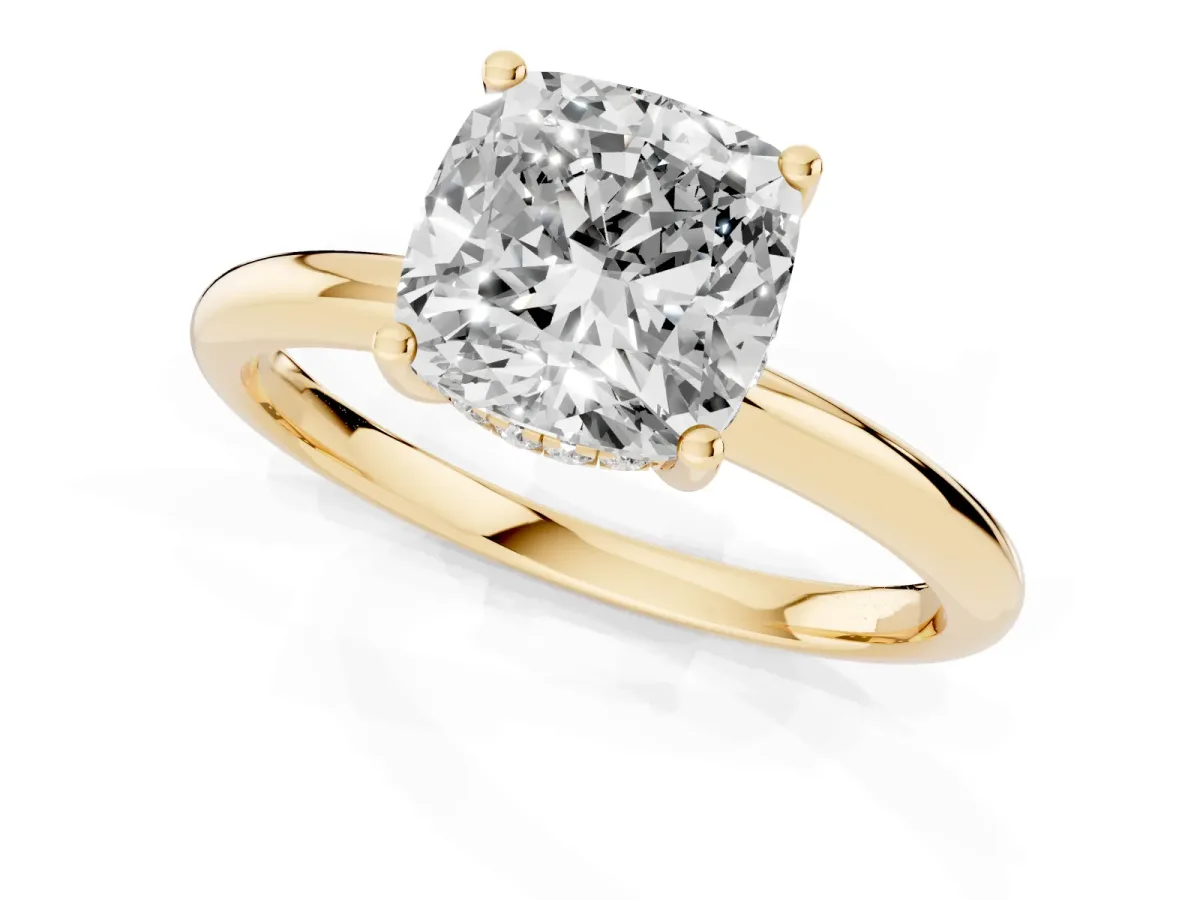 Cushion Cut Cut Solitaire Engagement Ring with Four-Prong Setting and Classic Band Yellow gold