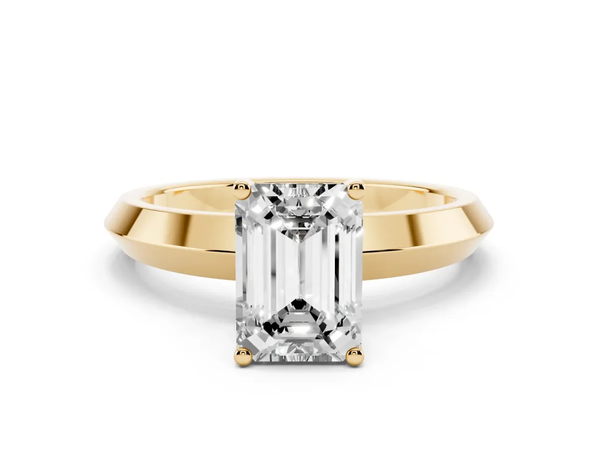 Emerald Cut Cut Solitaire Engagement Ring with Flat Band and Four-Prong Setting Yellow gold