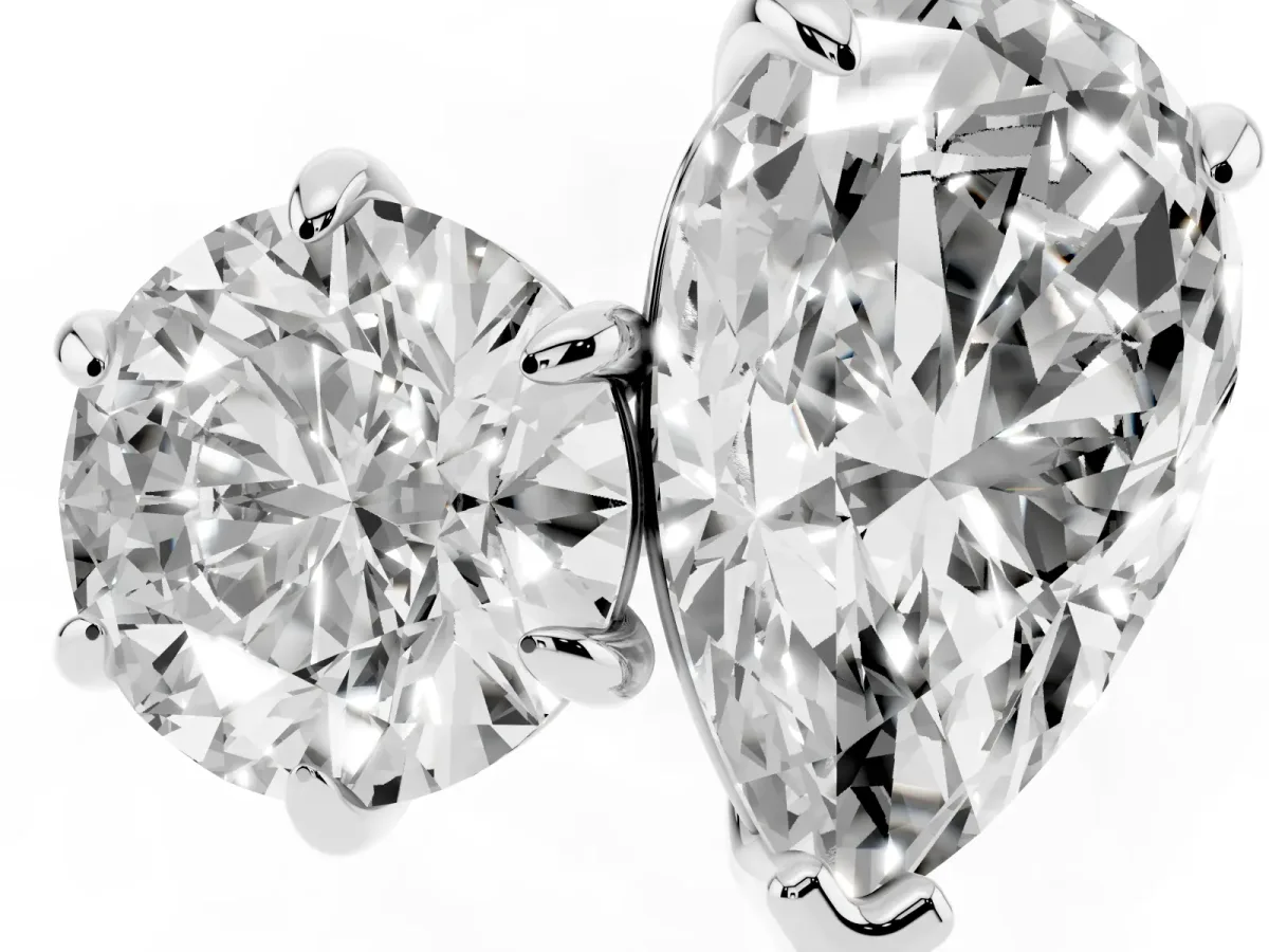 Round and Pear Toi Moi Ring with Prong Setting and Plain Band Platinum
