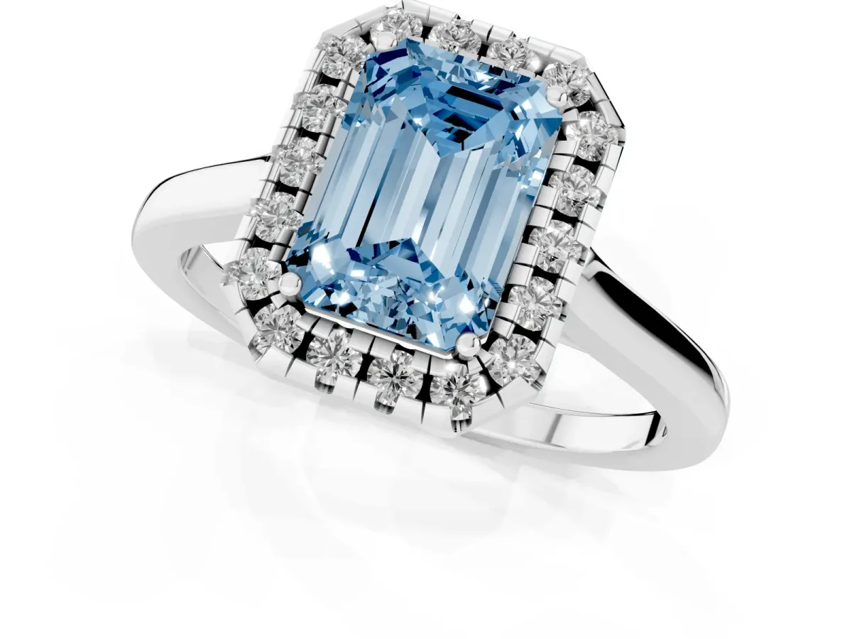Fancy Blue Emerald Cut Halo Round Diamond Solitaire Ring with Pavé Band and Four-Prong Setting Silver