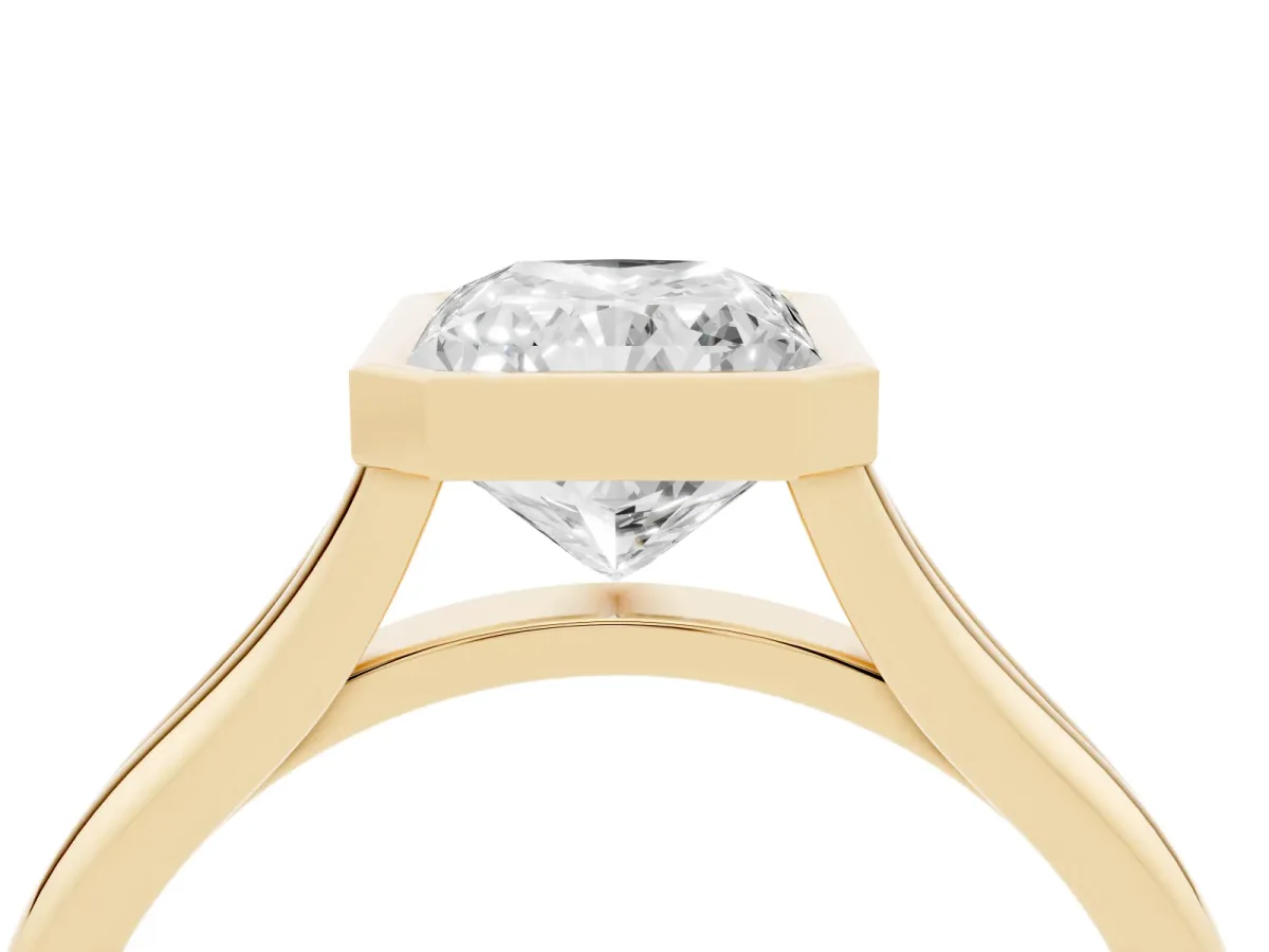 Bezel Set Radiant Cut Cut Solitaire Ring with Tapered Band Yellow gold