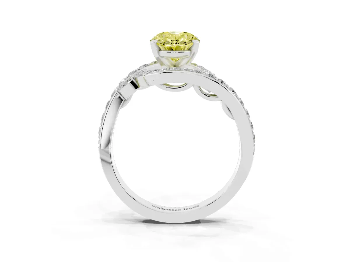 Fancy Yellow Oval Cut Solitaire with Pavé Twist Band and Four-Prong Setting Silver