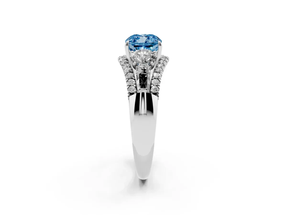 Fancy Blue Three-Stone Cushion Cut Diamond Engagement Ring with Pave Band and Prong Setting Platinum