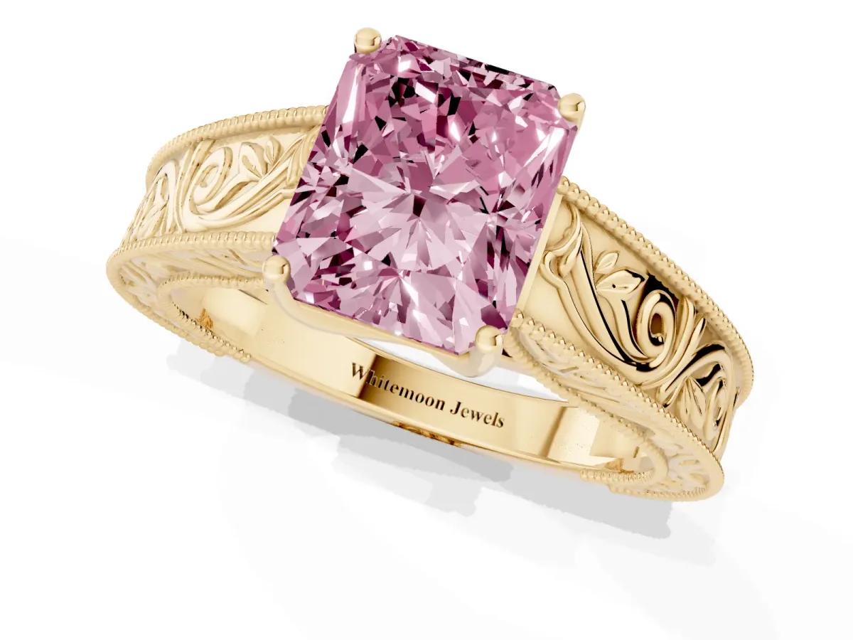 Fancy Pink Radiant Cut Diamond Solitaire Ring with Engraved Band and Four-Prong Setting Yellow gold