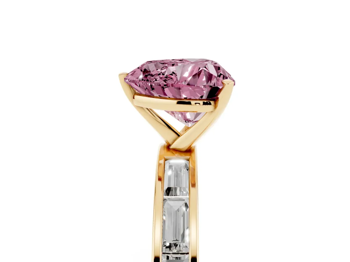 Fancy Pink Heart Cut Solitaire Diamond Ring with Channel-Set Baguette Band and Four-Prong Setting Yellow gold