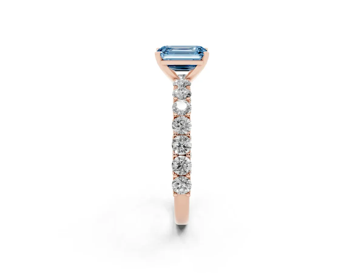 Fancy Blue Emerald Cut Diamond Solitaire Ring with Shared Prong Pavé Band and Four-Prong Setting Rose gold