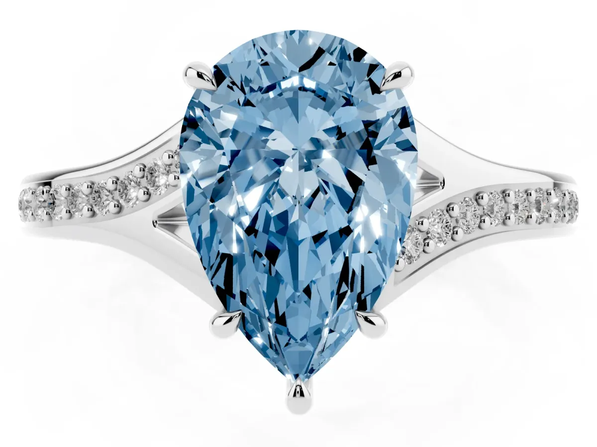 Fancy Blue Pear Cut Diamond Solitaire Ring with Pavé Band and Prong Setting Silver