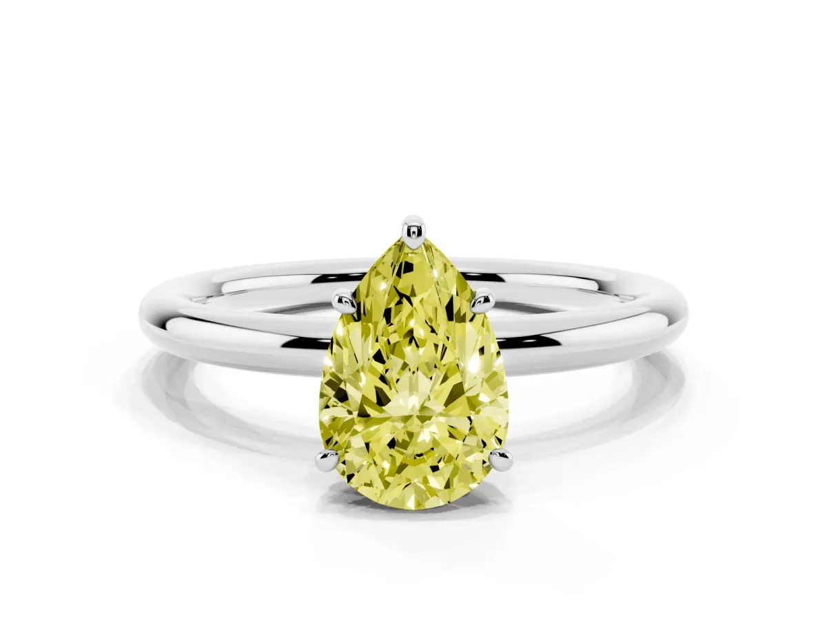 Fancy Yellow Pear Cut Solitaire Diamond Ring with Four-Prong Setting on a Plain Band White gold