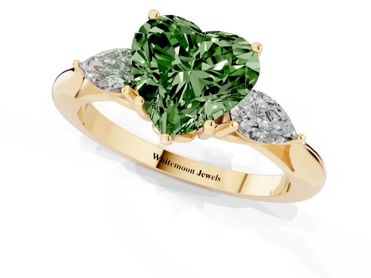 Fancy Green Heart Cut Diamond Three-Stone Ring with Pear Side Stones and Prong Setting Yellow gold