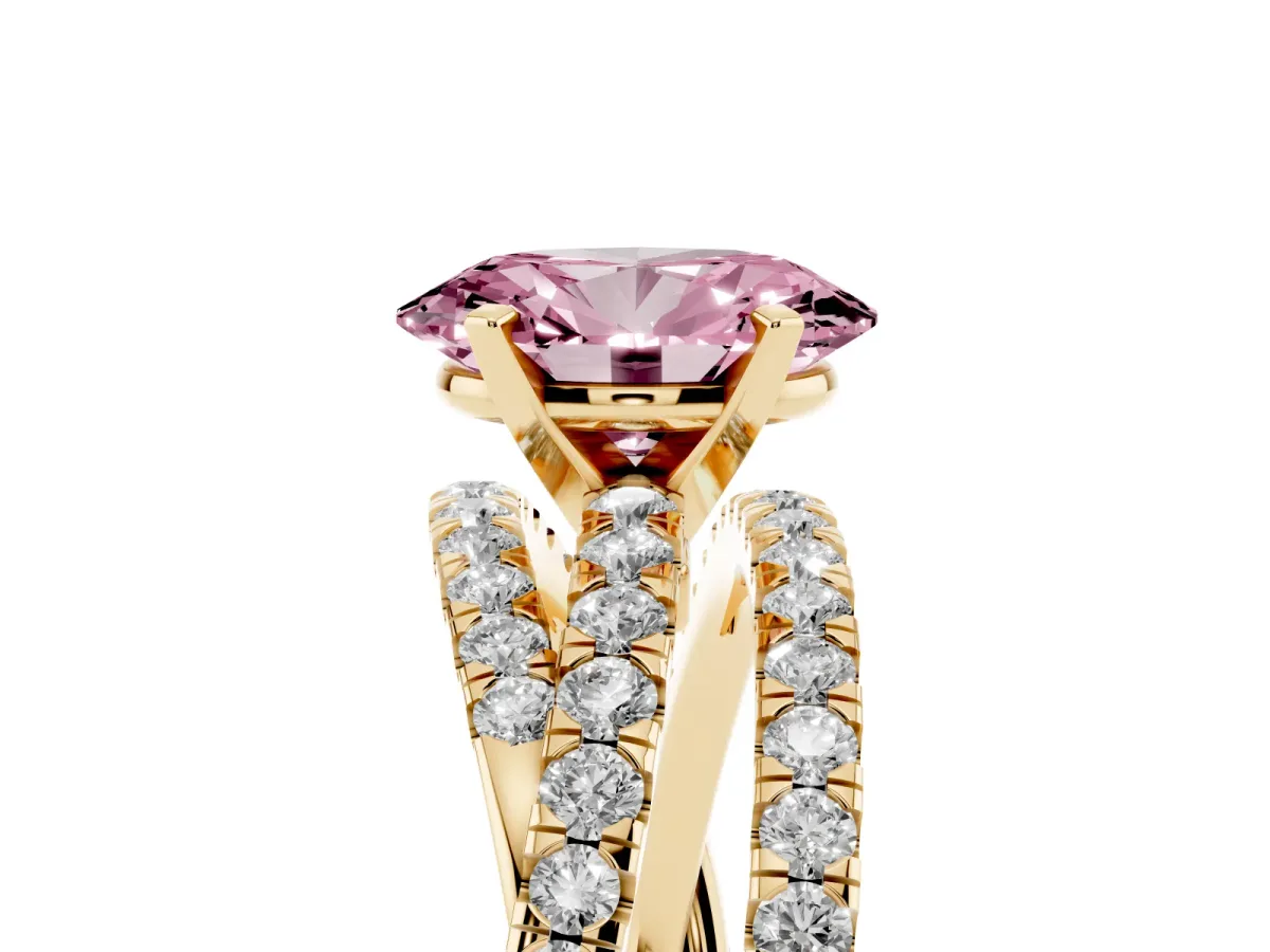 Fancy Pink Oval Cut Solitaire Twist Band with Pavé Setting and Four-Prong Setting Yellow gold
